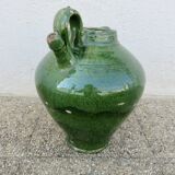 Antique glazed green terracotta oil jar, late 19th century.