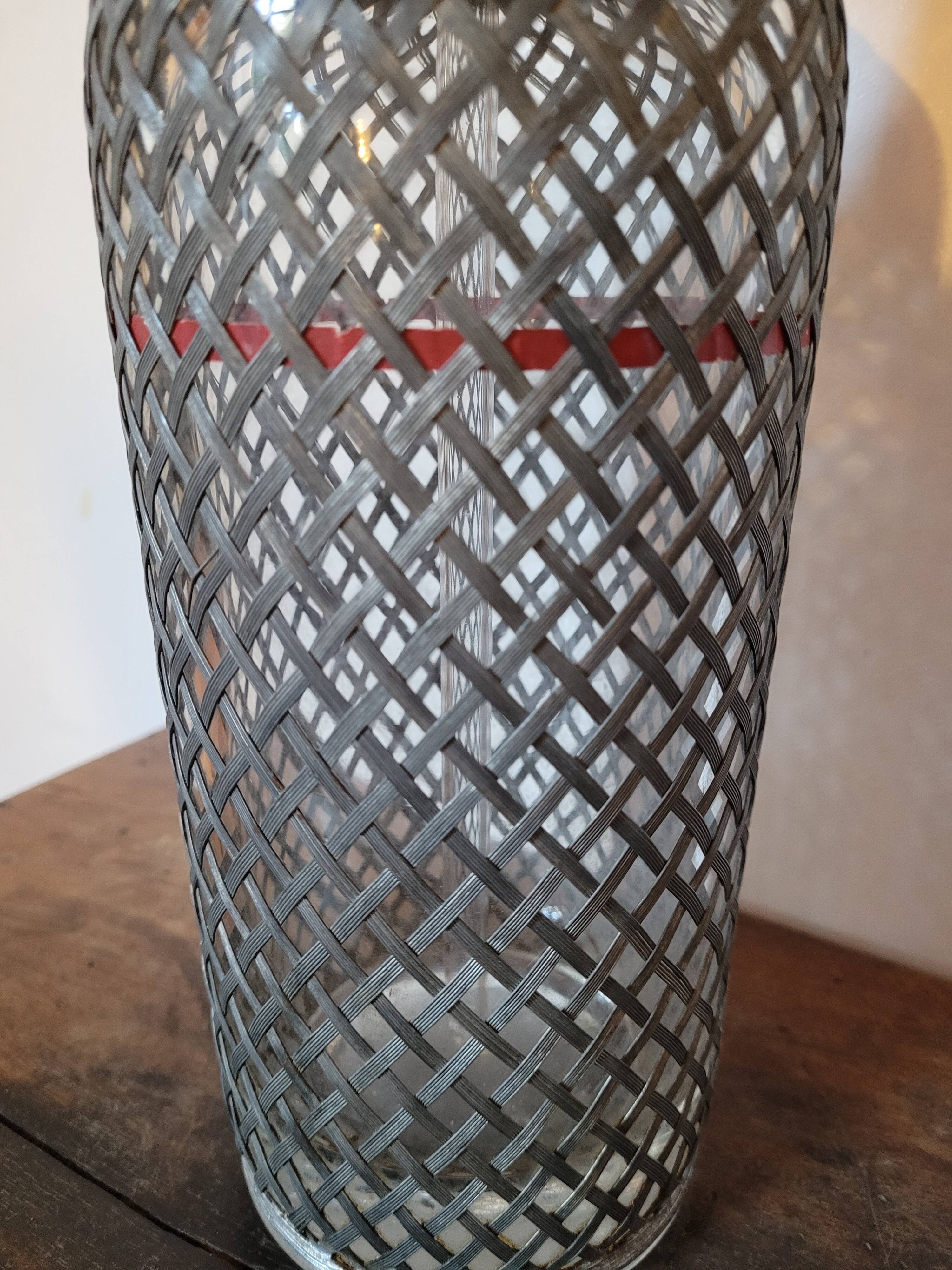 Old glass and metal siphon