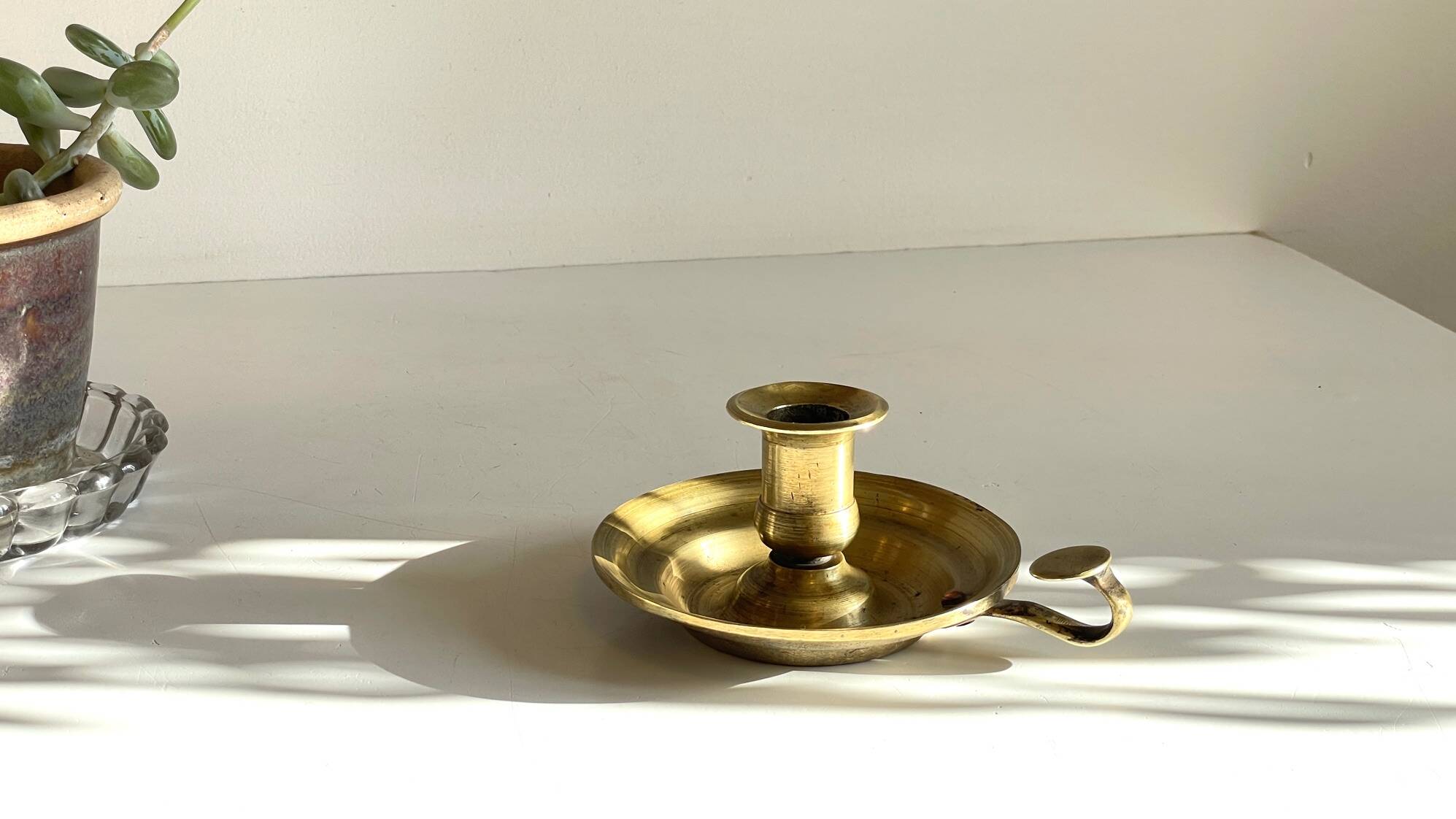 Antique solid bronze hand candlestick