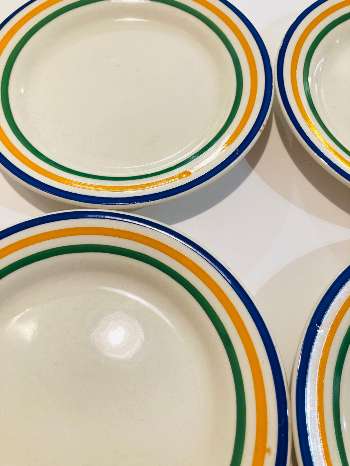 4 striped earthenware plates made in Romania