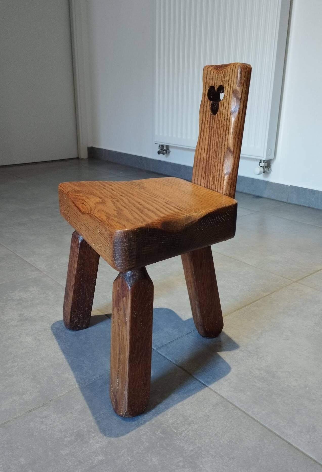 Tripod chair for children, Scandinavian brutalist chalet design.