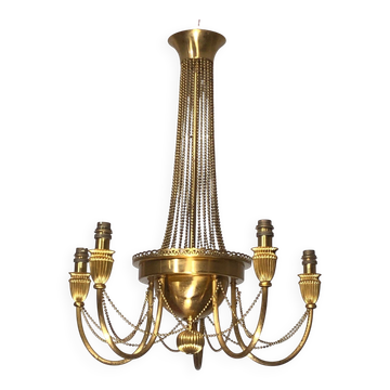 Neoclassical style brass chandelier decorated with pearl garlands