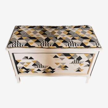 Black gold and white chest