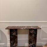 designer console in red rosso levanto marble