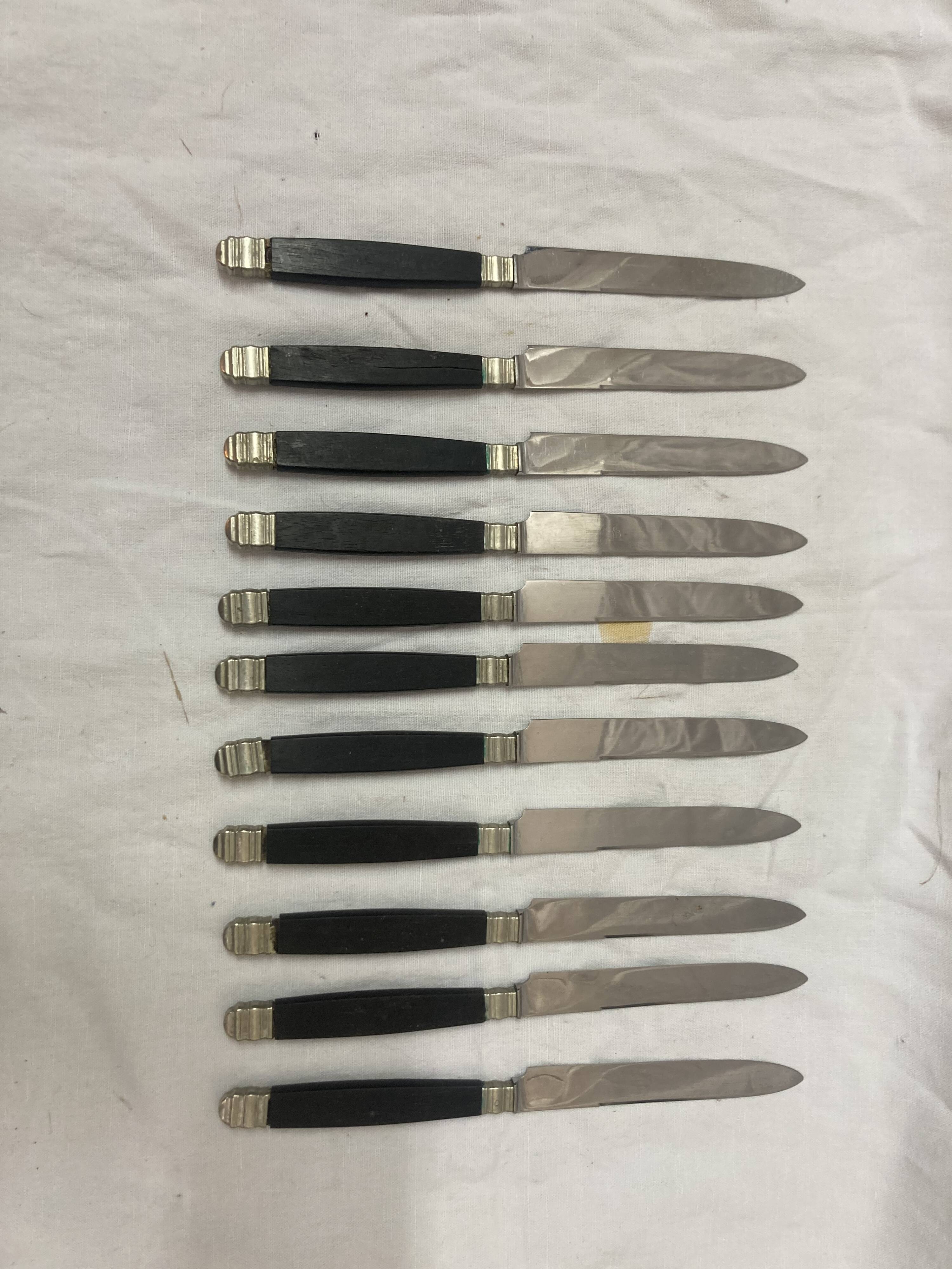 19th century ebony silver cheese knives
