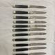 19th century ebony silver cheese knives