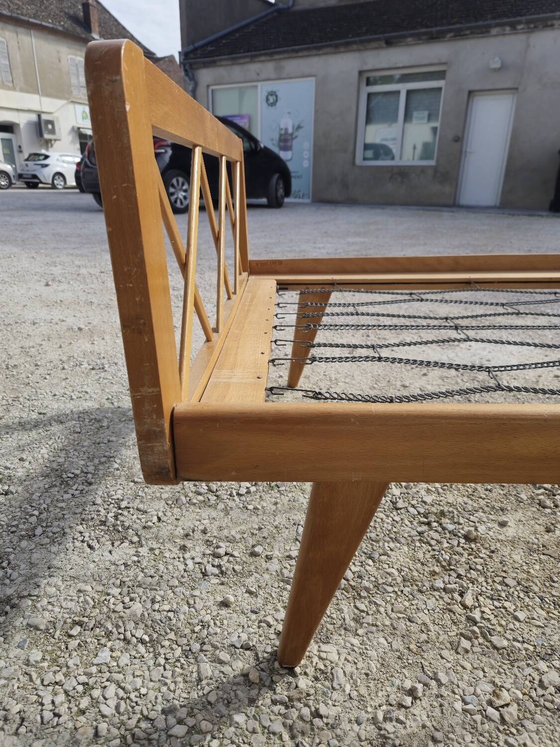 Vintage bed with compass feet from the 1950s