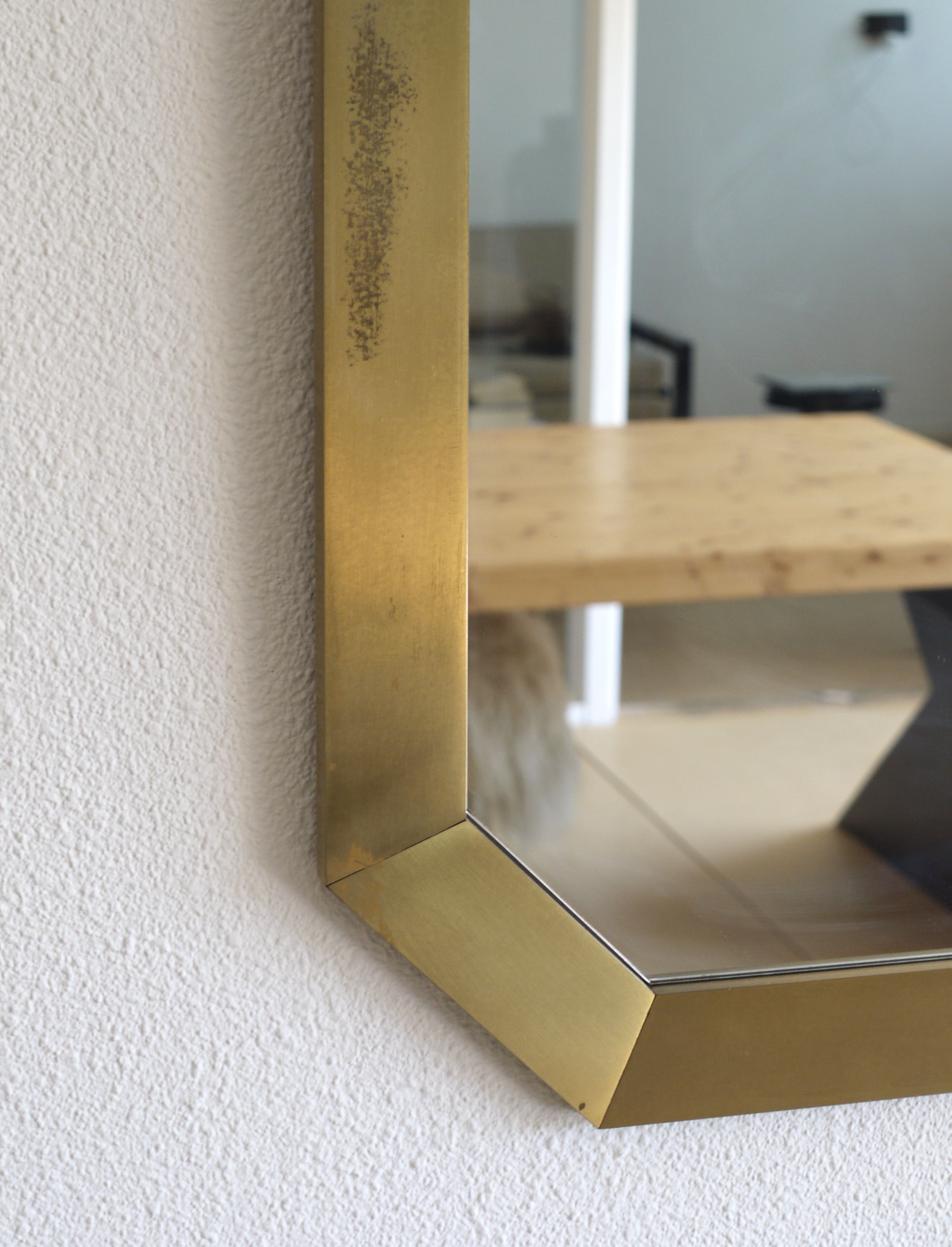 Modernist brass and glass console table & mirror. 1970s