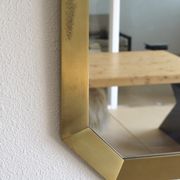 Modernist brass and glass console table & mirror. 1970s