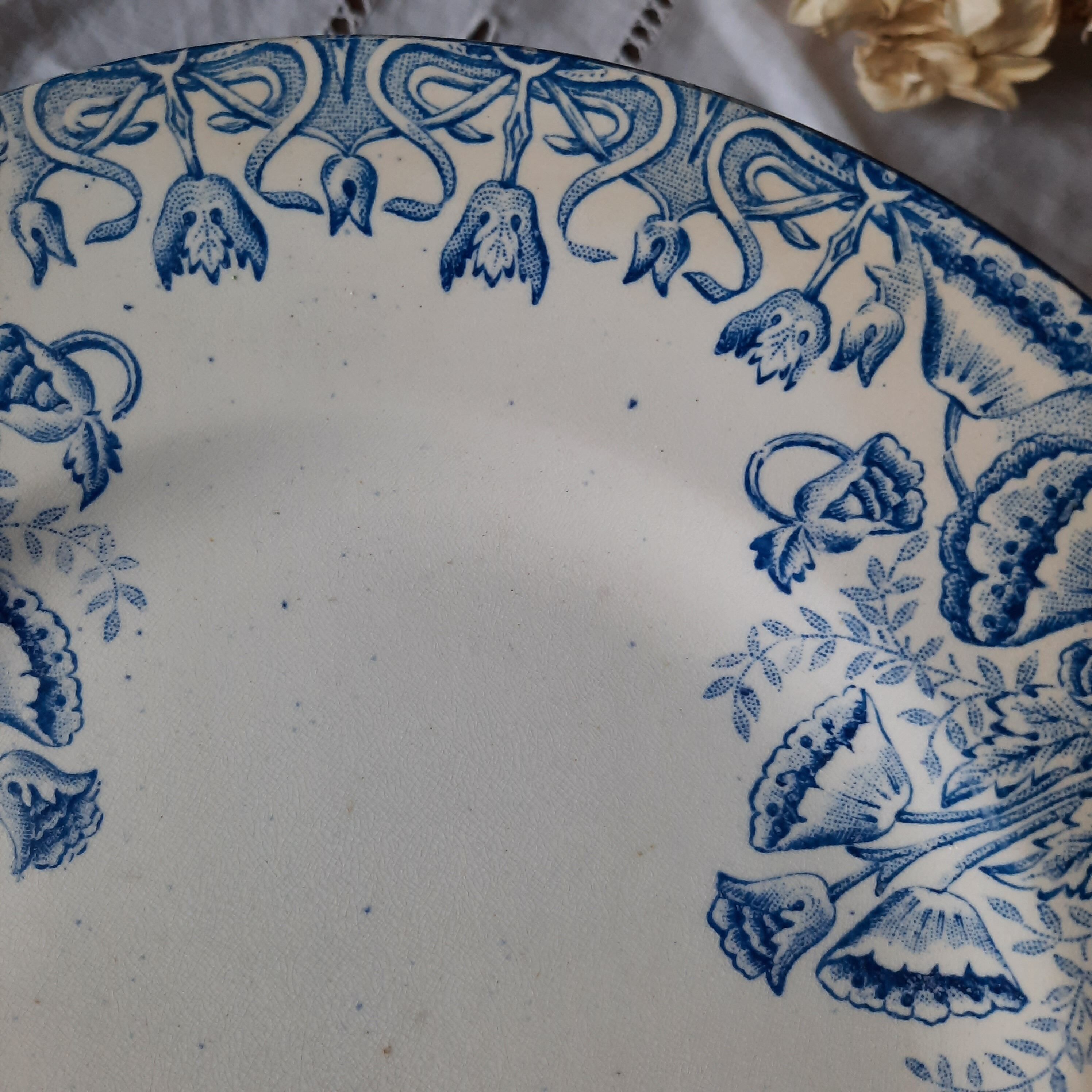 Old flat plates mismatched in earthenware