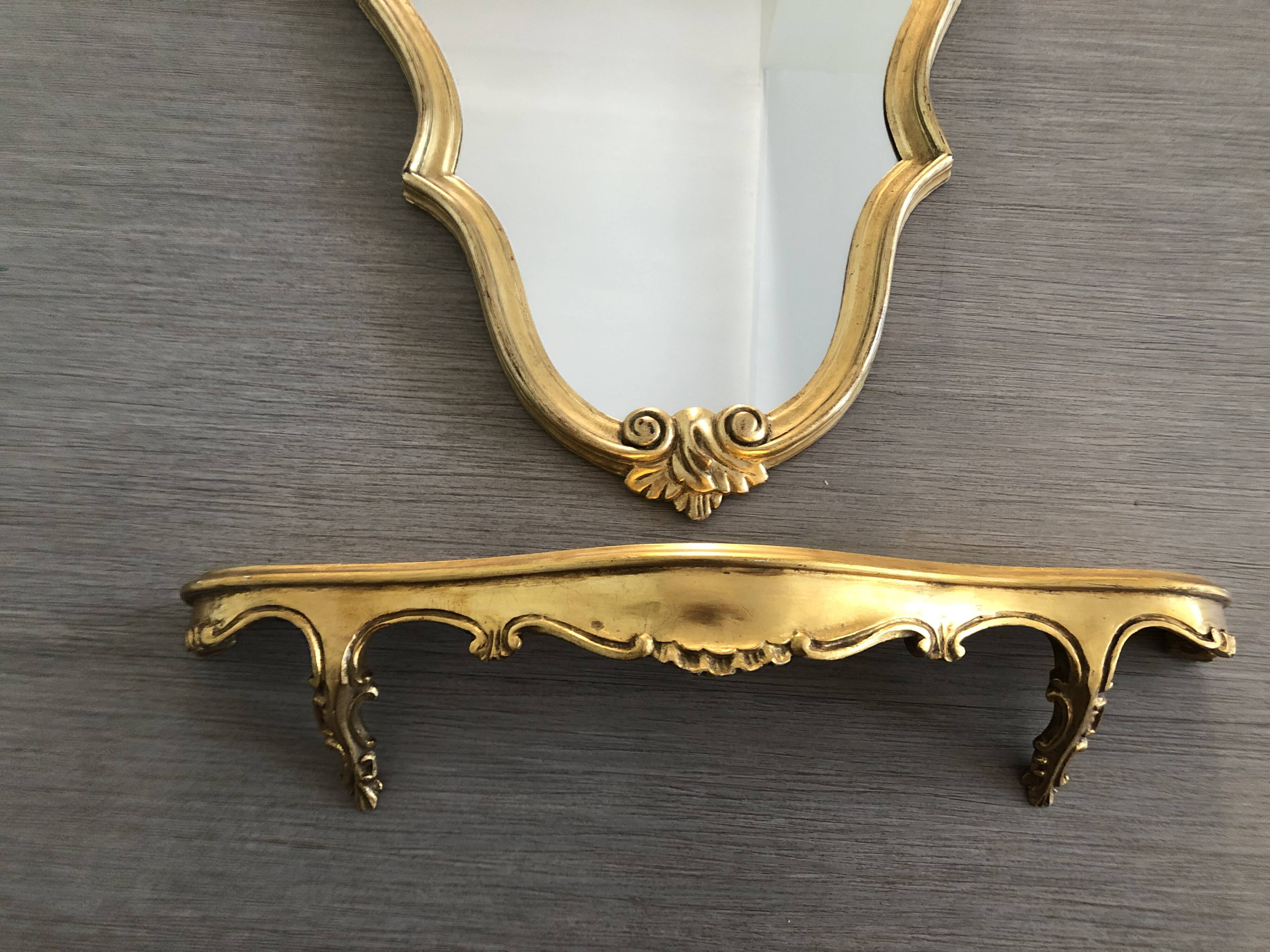 Golden baroque mirror with its 54x86cm tablet