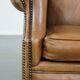 Sheep leather wingback chair with patina