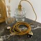 Baladeuse avec globe vintage en verre