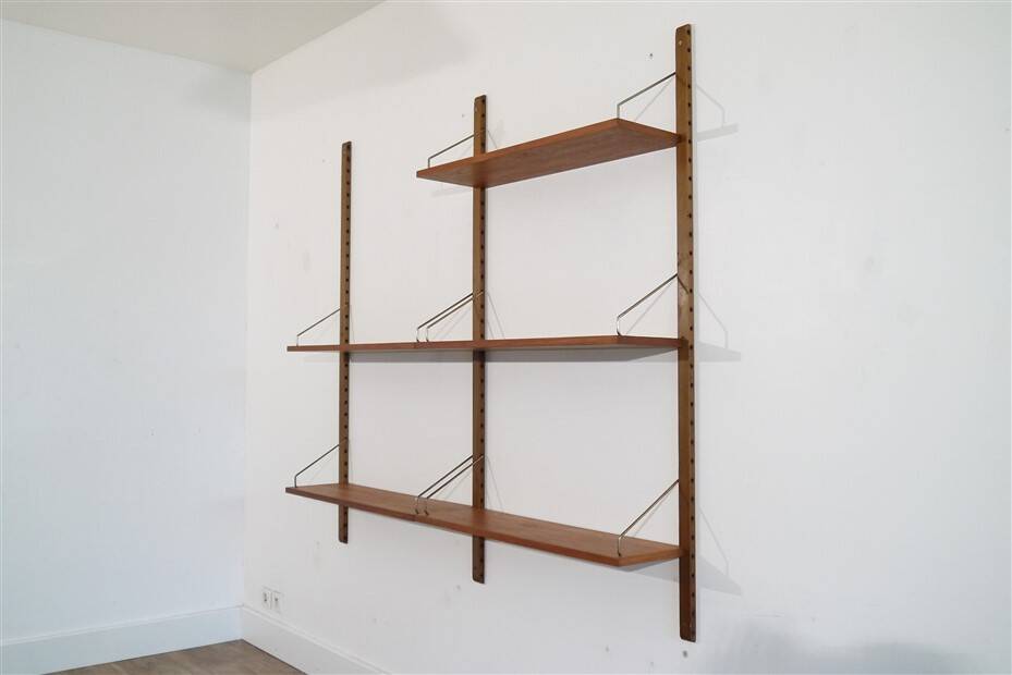 Danish wall shelving system in teak from the 1960s.