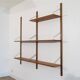 Danish wall shelving system in teak from the 1960s.