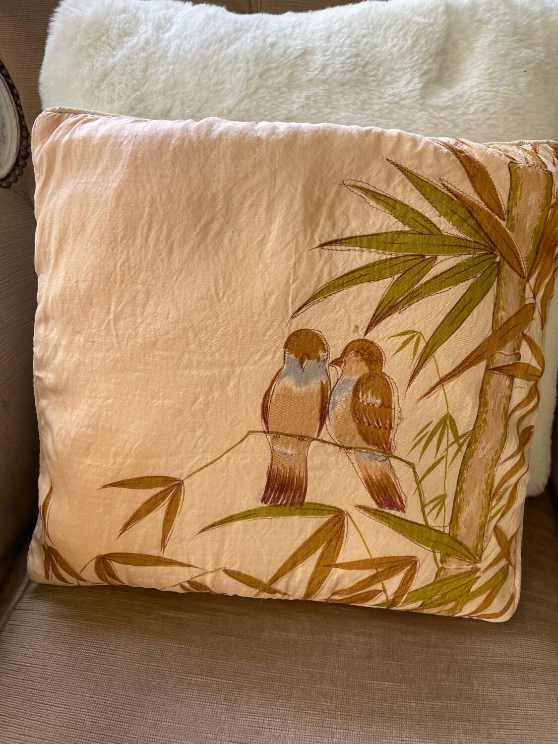 Vintage cushion decorated with birds, Thailand