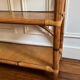 Tall rattan shelf