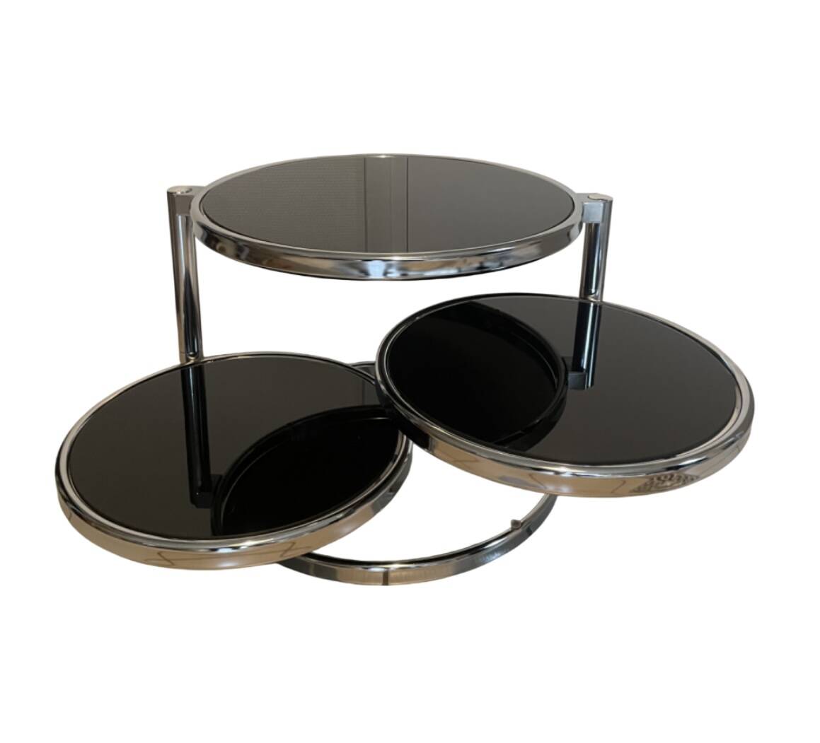 Coffee table with 3 chrome and smoked glass tops.