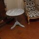 Patinated wooden pedestal table