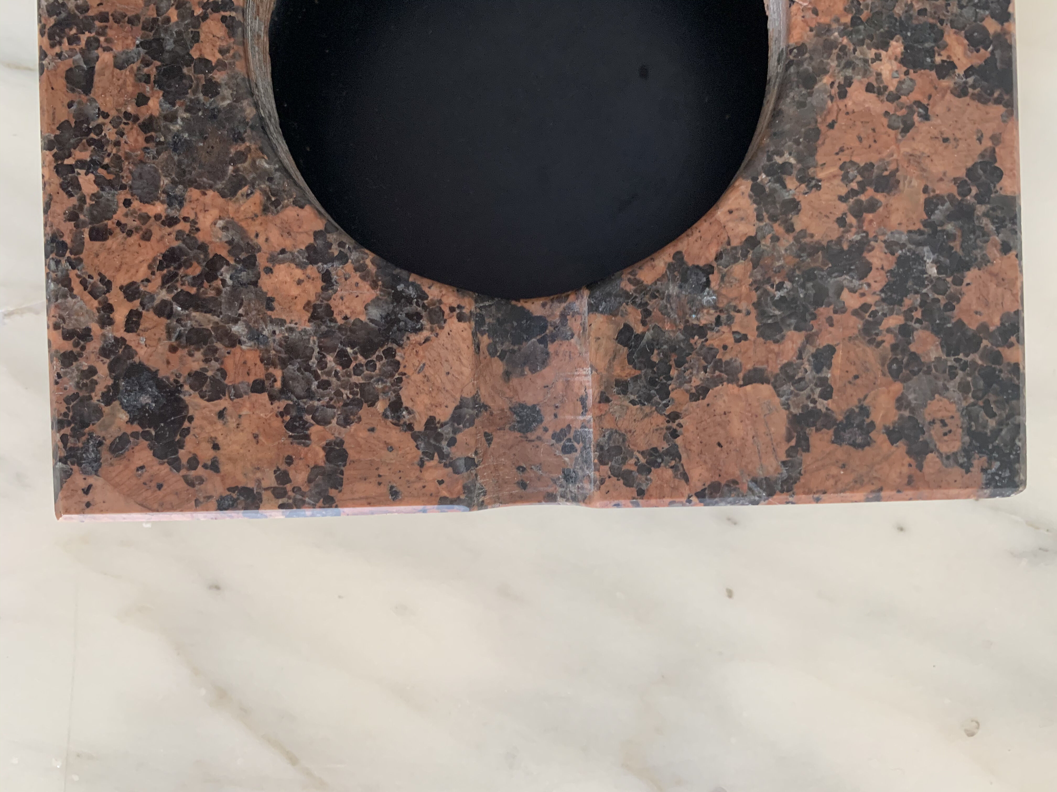 Red and black marble ashtray