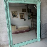 Large antique mercury mirror, patinated blue sculpted frame.