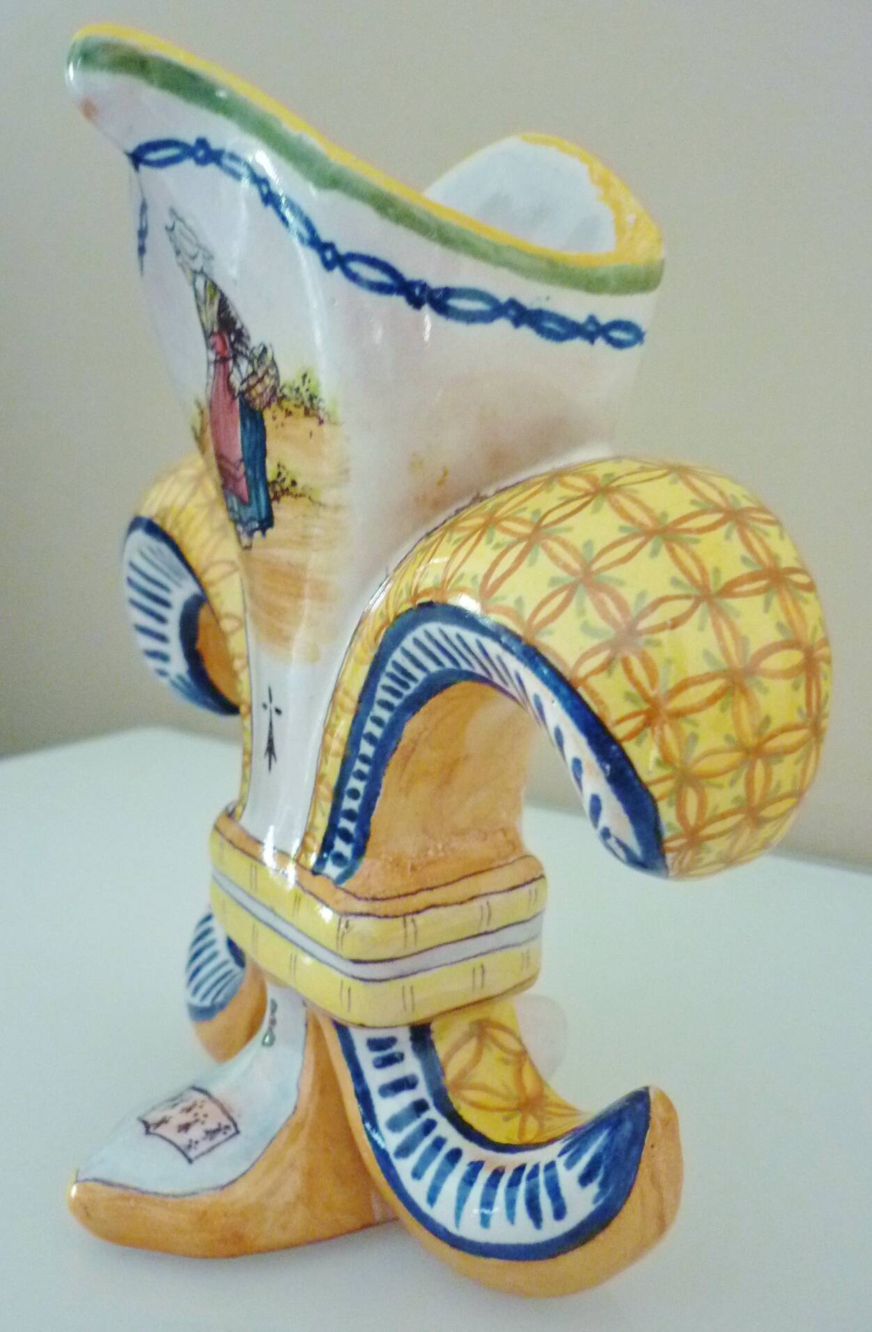 Fleur-de-lis shaped vase, glazed ceramic, Brittany, Quimper, Breton ermines, character