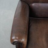 Set of two characterful sheepskin armchairs with a beautiful deep colour