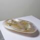 Antique mother-of-pearl tripod bowl emptier with silver metal legs