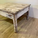 White patinated wooden coffee table