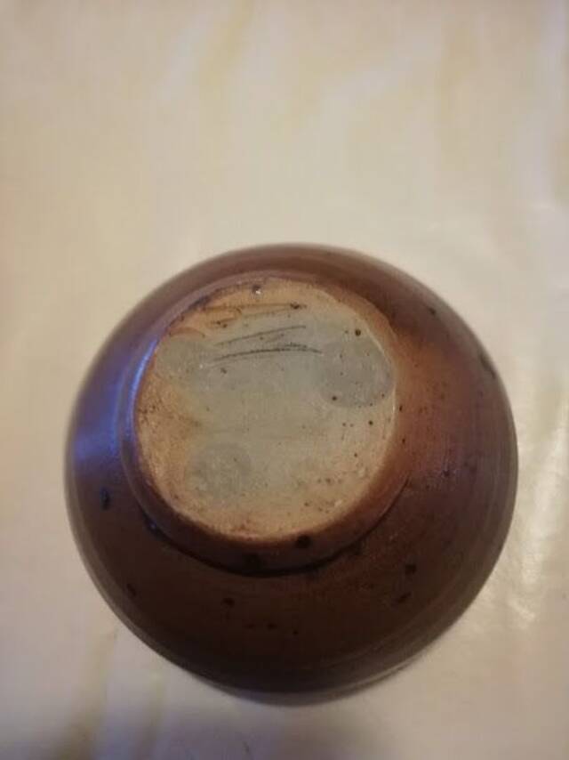 Enamelled ceramic cup