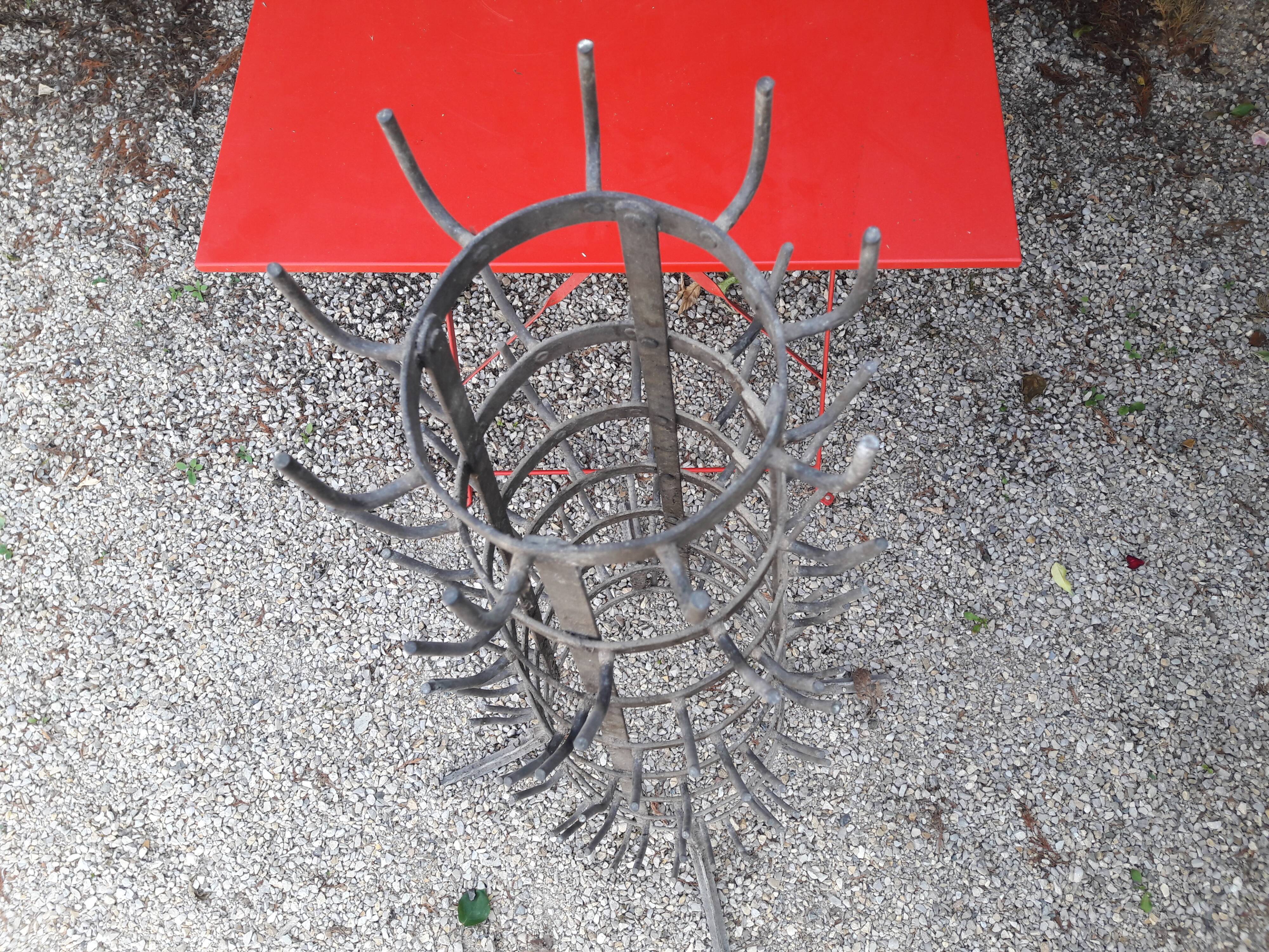 Wrought iron hedgehog for bottle