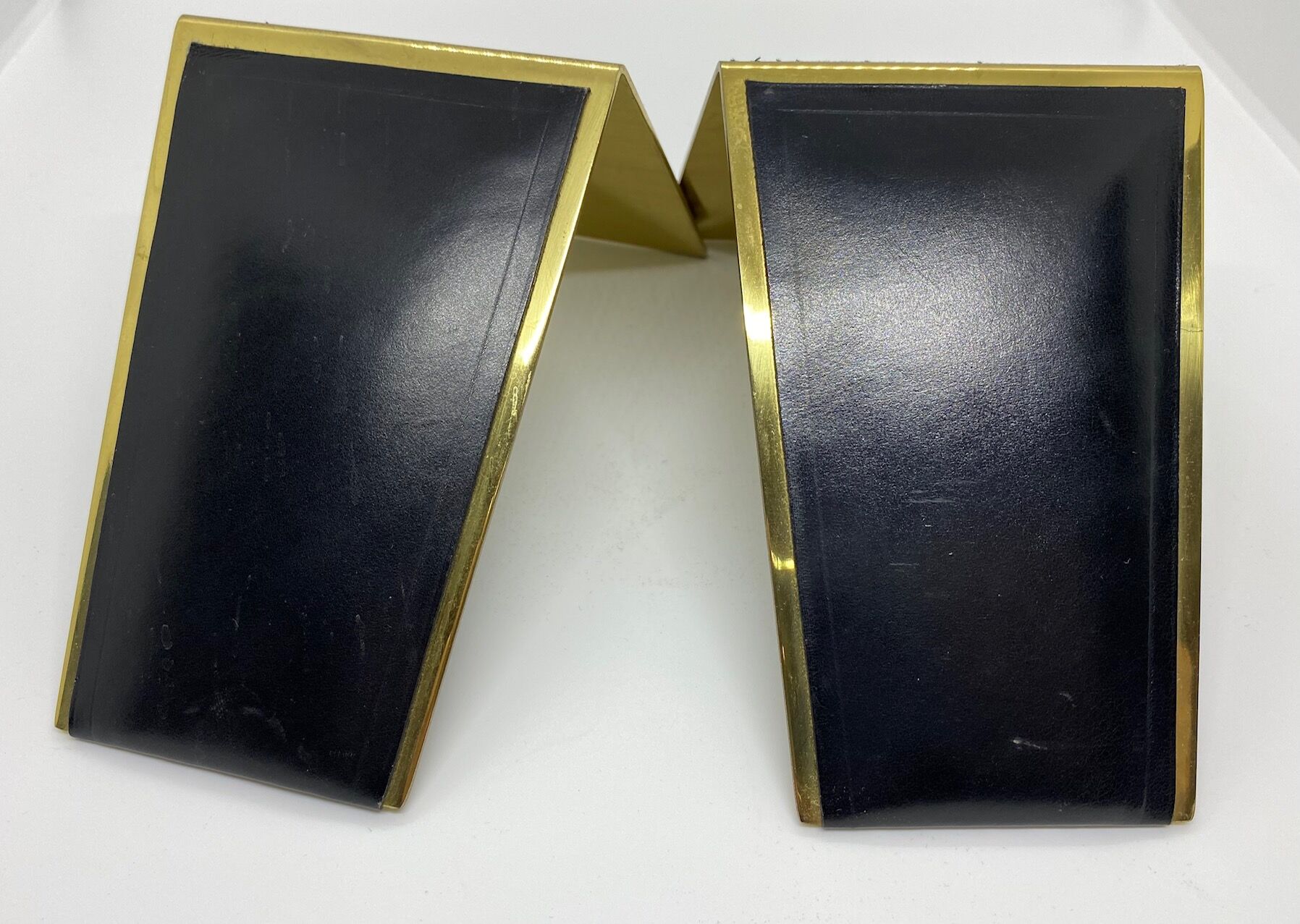 Vintage bookends, black leather and brass