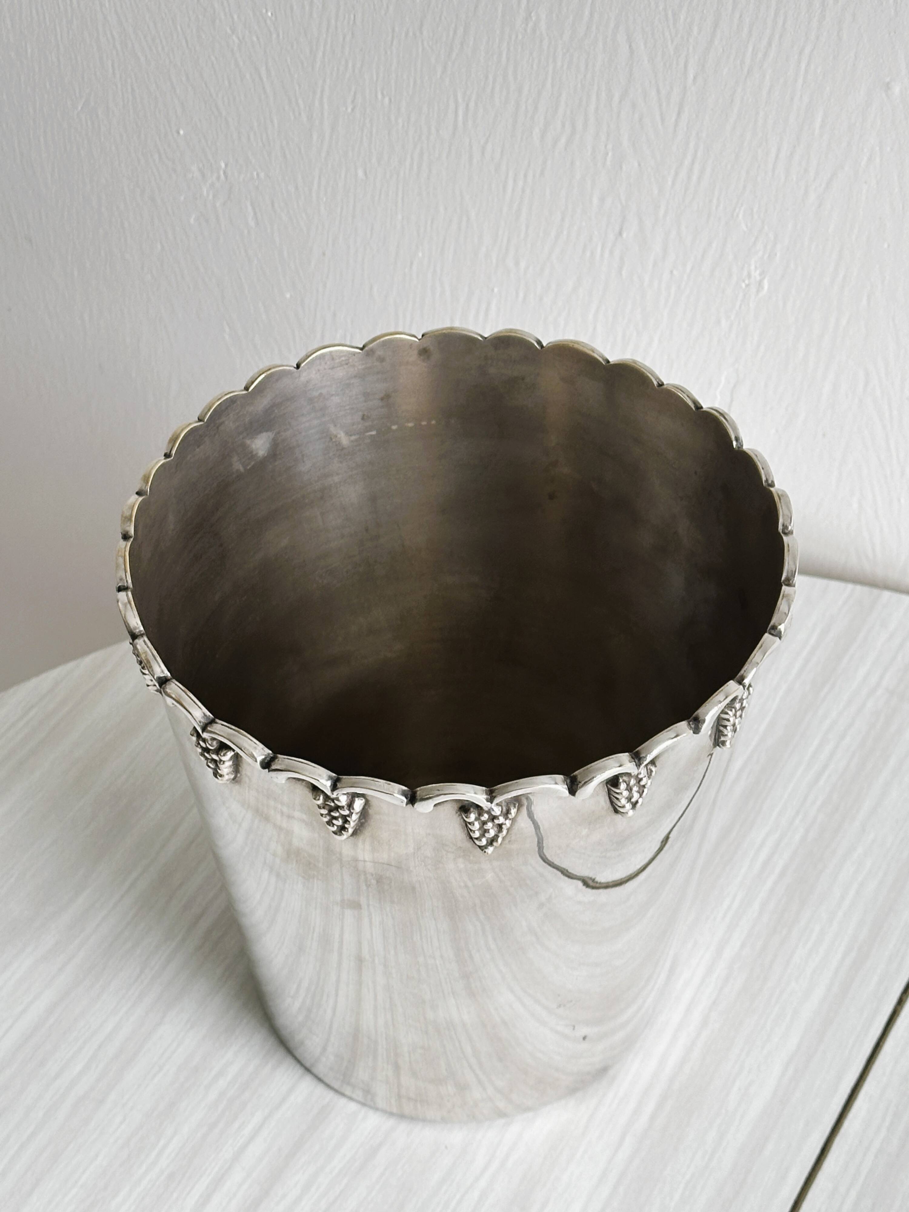 Antique champagne bucket in shiny silver metal