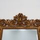 Grand miroir mural richement décoré de style baroque italien du XXe siècle