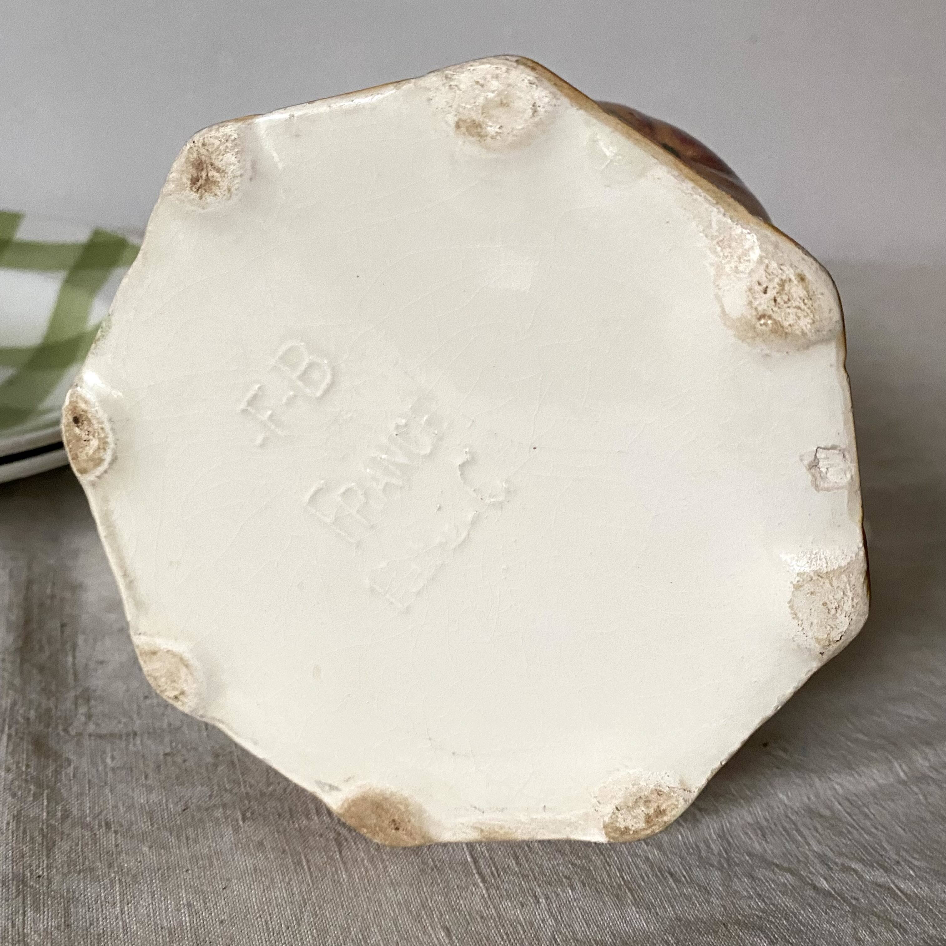 Antique pitcher in Apple slip