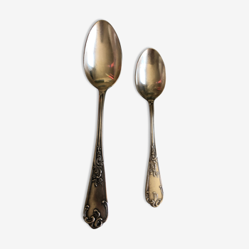 Duo of silver metal spoons