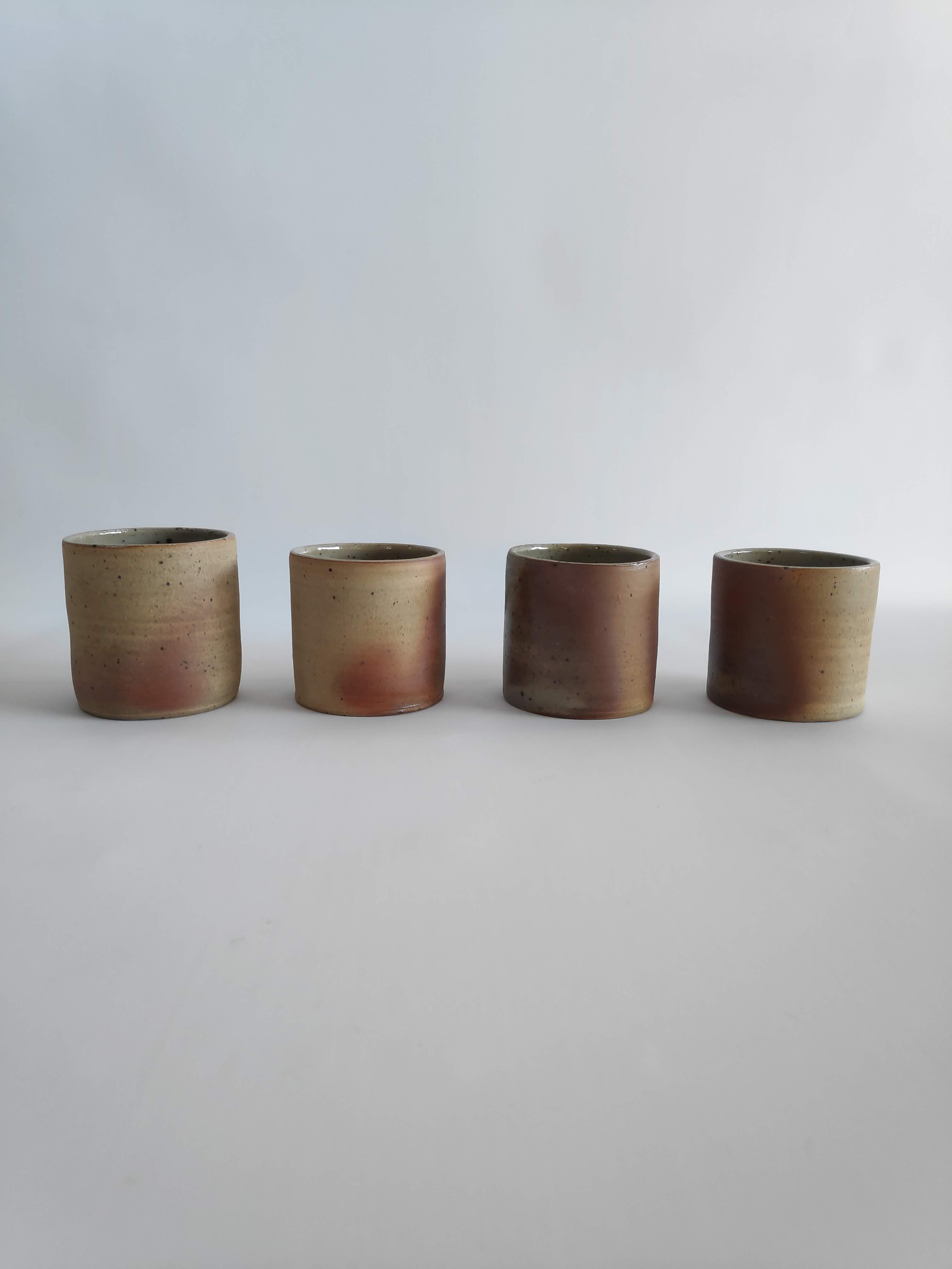 4 mugs in ochre sandstone from the 60 years