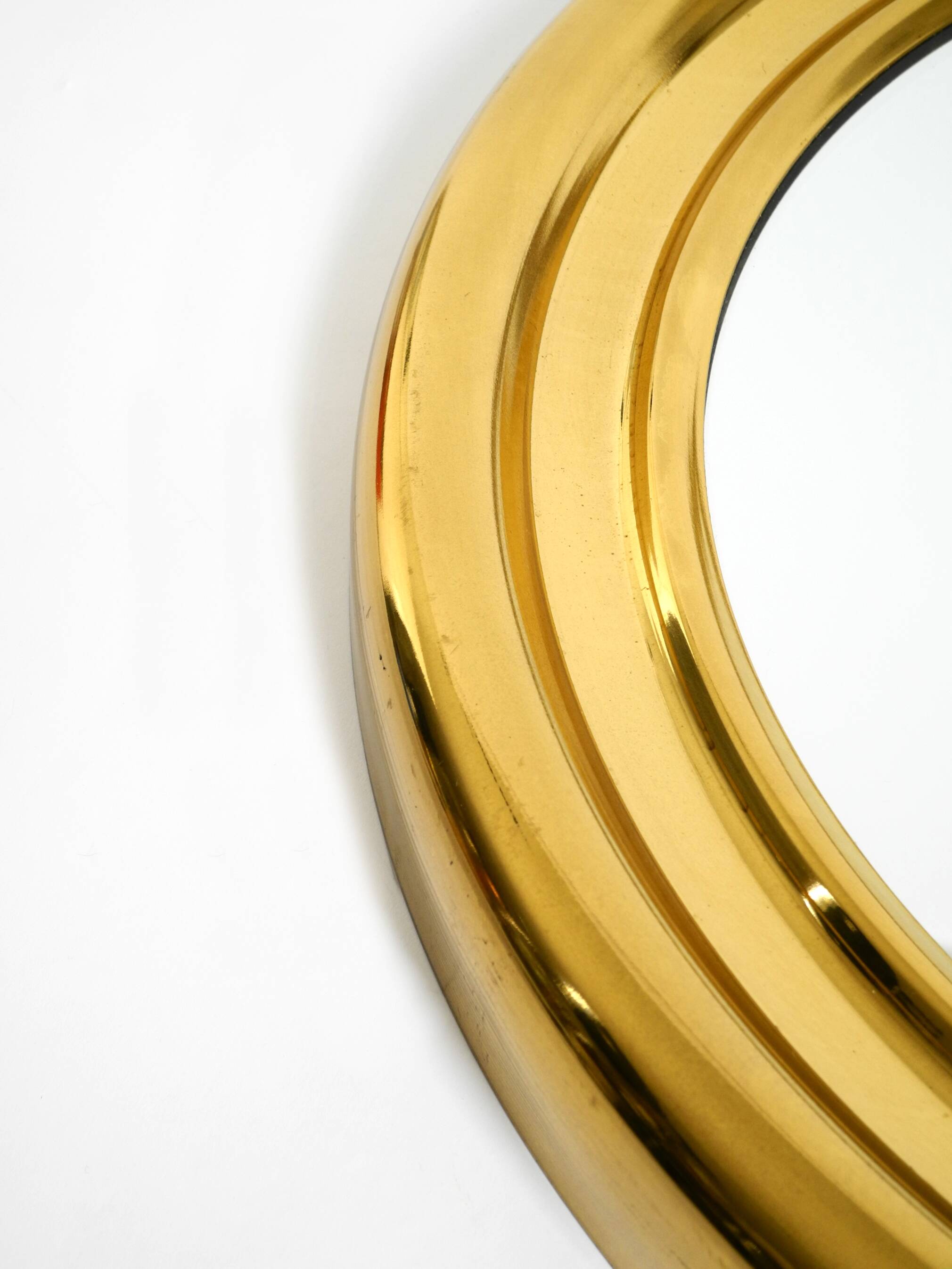 Beautiful, heavy, round Italian brass mirror from the 1960s