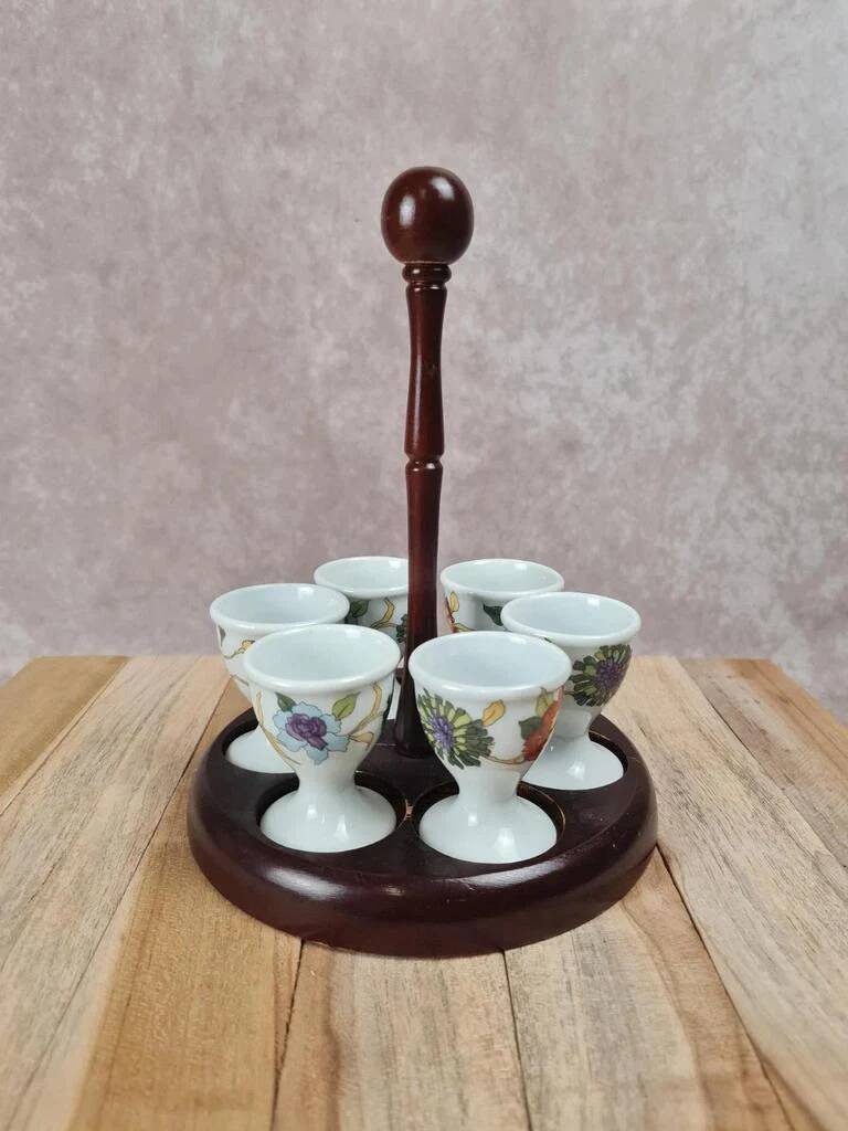 Set of 6 antique egg cups in porcelain from Paris + wooden stand