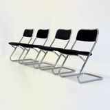Set of 4 vintage tubular frame dining chairs in black velvet