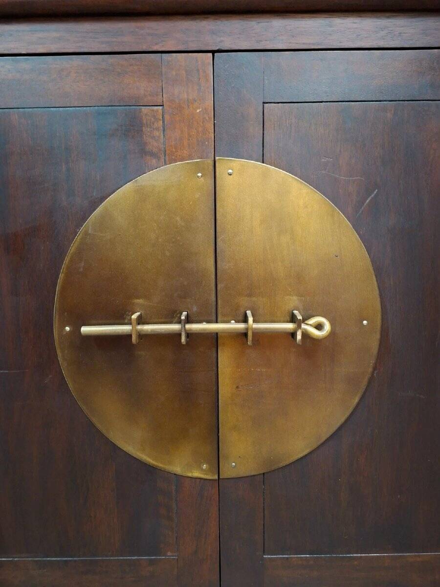 Buffet / antique Chinese wooden cabinet with brass fittings.