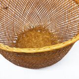 Openwork braided rattan basket