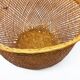 Openwork braided rattan basket