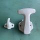 Two white porcelain coat hooks, one small and one larger, old