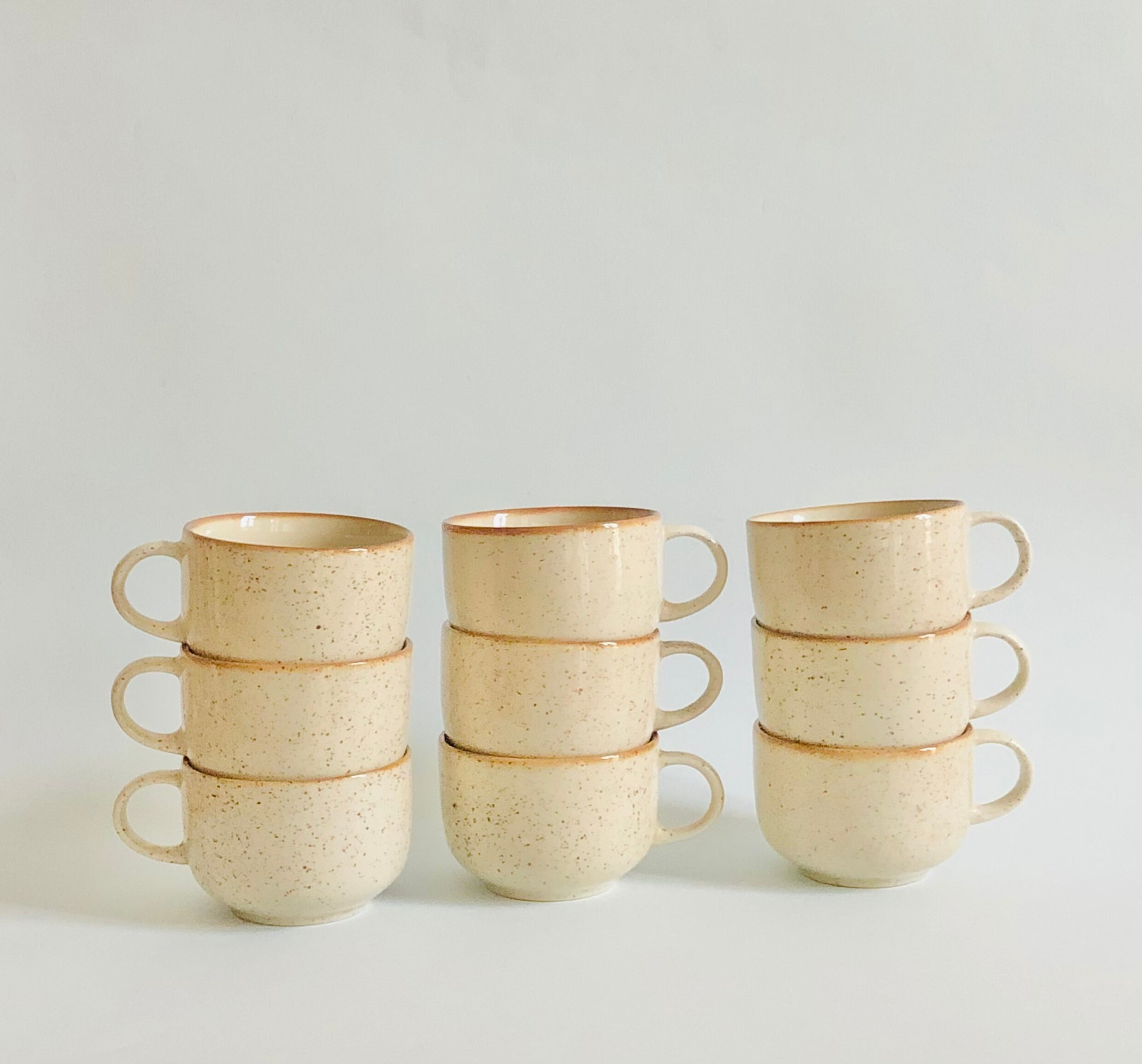 Set of 9 speckled ceramic coffee cups