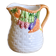 Hand-painted earthenware carafe with a raised vegetable basket design