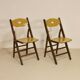 Pair of vintage folding chairs year 50 sculpted backrest.