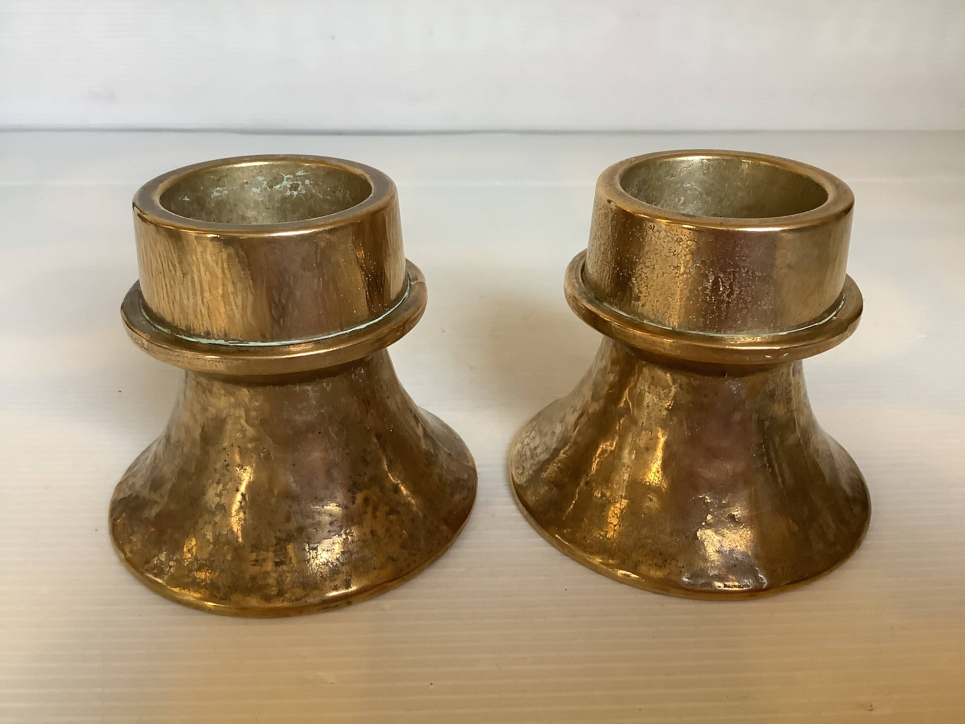 Pair of bronze candlesticks with tulip base