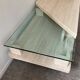 Table basse vintage en travertin et verre