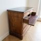 Antique walnut secretary chest with marble top.